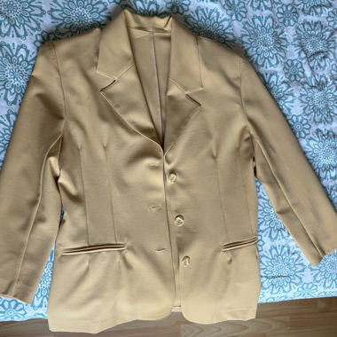 Pale yellow blazer with shoulder pads