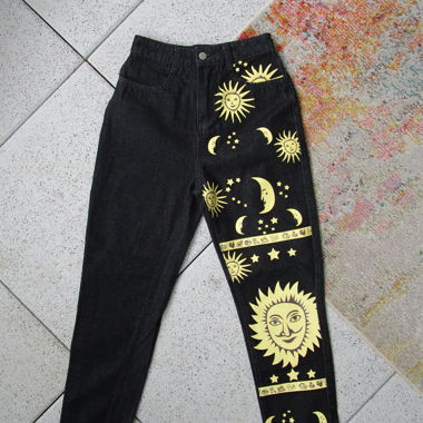 Jeans neri con motivo sole