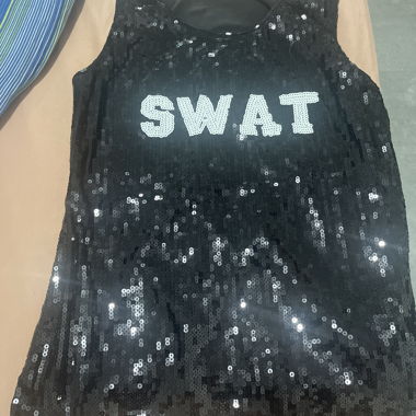 Top noir effet paillettes M