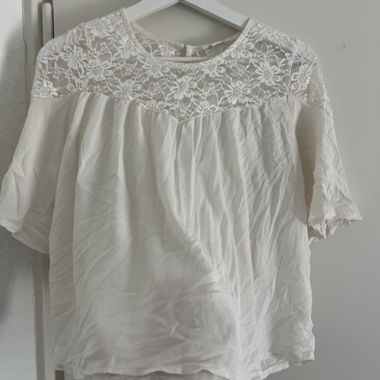 Blusa bianca in pizzo