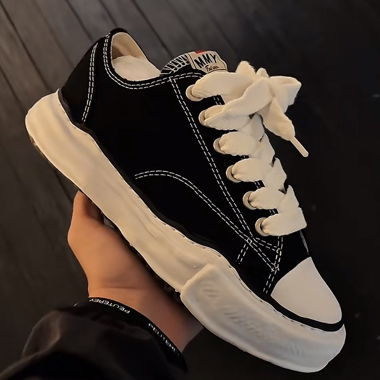 Schwarze MMY Sneaker