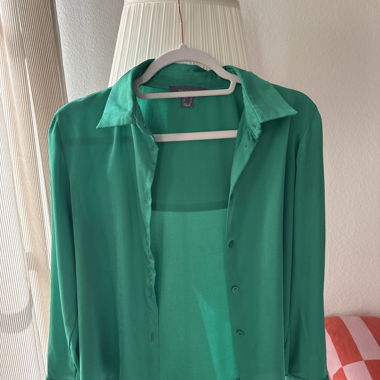 Green blouse with button placket