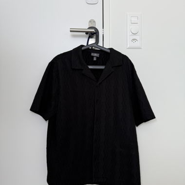 H&M schwarze Kurzarmbluse Regular Fit