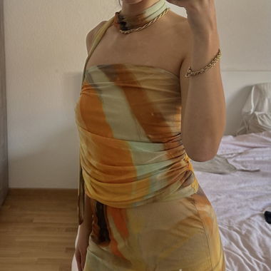 Ensemble top drapé et jupe longue