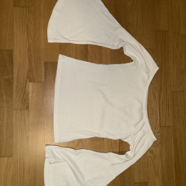 Top bianco con maniche larghe