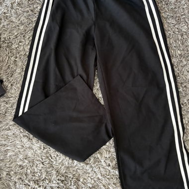 black joggers with white stripes