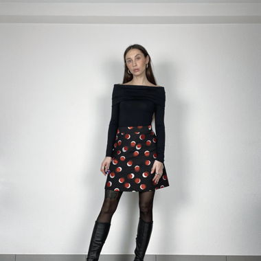 Black high waisted mini skirt with red dots