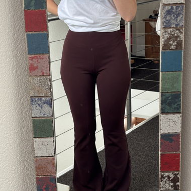 Flared pants in reddish brown