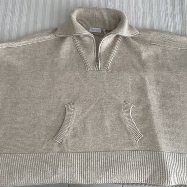 Poncho en maille beige avec fermeture éclair