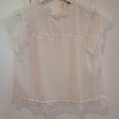 White blouse with ruffle collar