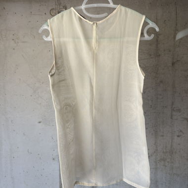 White sleeveless top