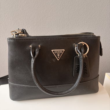 nuova borsa Guess - macchie