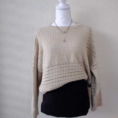 cream sweater boho style with holes