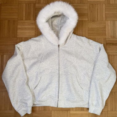 Felpa con zip e cappuccio in pelliccia