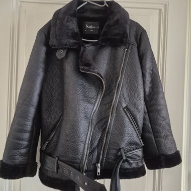 Black aviator jacket with faux fur lining