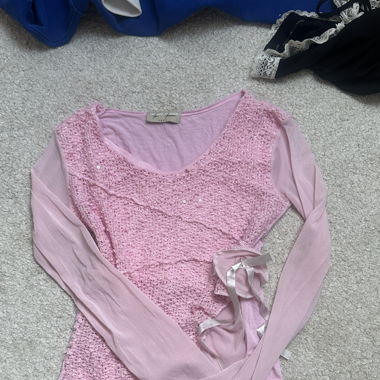Coquette Langarm-Top mit Pailletten
