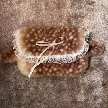 Sac à main en fausse fourrure avec dentelle et nœud