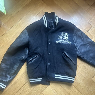 Veste varsity noire et blanche