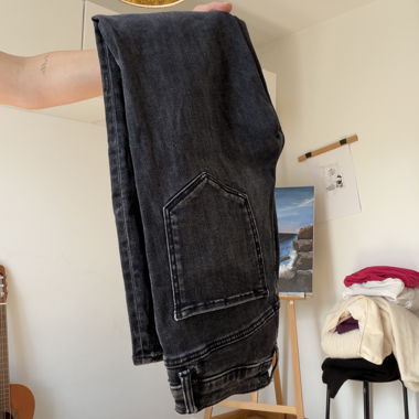 Jeans neri con tasche