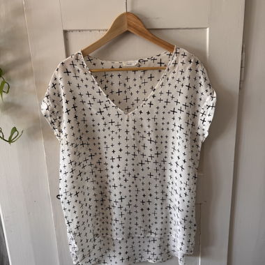Blusa in seta con motivo 100%