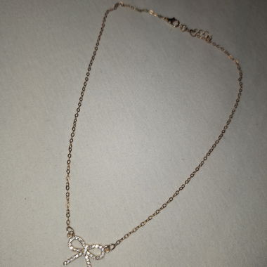 Gold-colored Chain with Bow