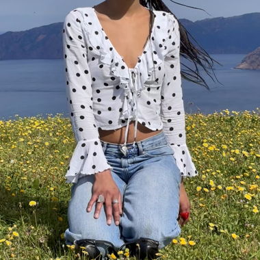 White top with black dots