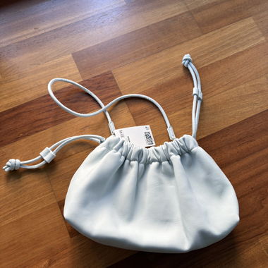 Light blue “leather” bag