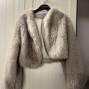Veste en fausse fourrure beige clair