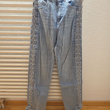 Jeans a vita alta con lacci lucidi