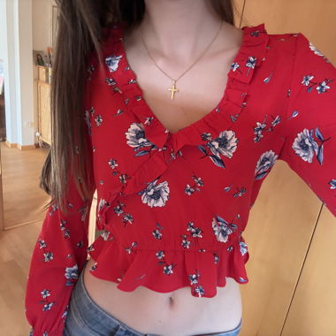 Top floreale H&M rosso