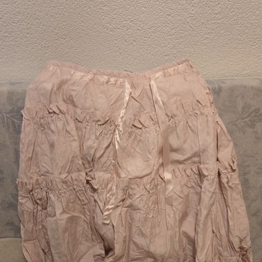 Jupe rose poudré à volants