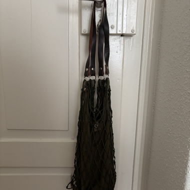 Mesh shopping bag with leather handles