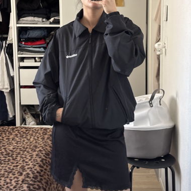 Schwarze adidas Windjacke