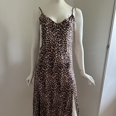 Leopard print slip dress with a sleek midi length 