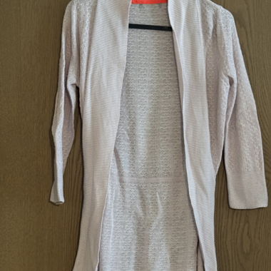 Cardigan en maille ajourée rose