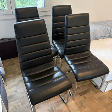 4 black cantilever chairs