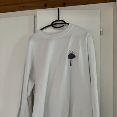 cool white sweater with print