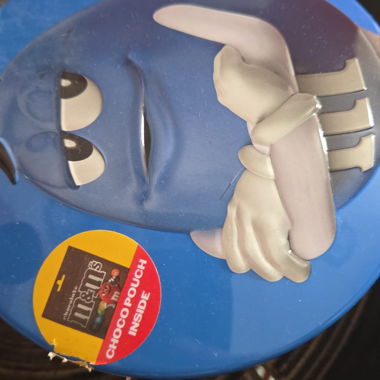 Boîte M&M’s bleue ronde en métal