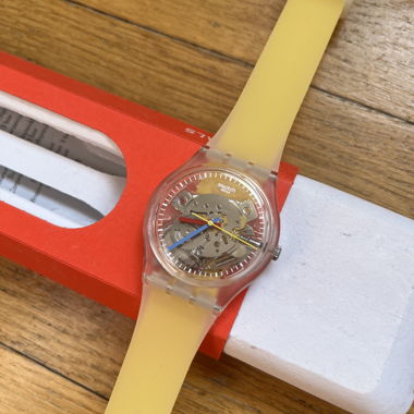 Swatch analog strap watch yellow transparent