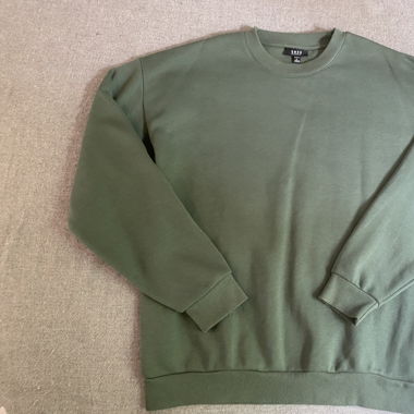 Grüner Pullover 