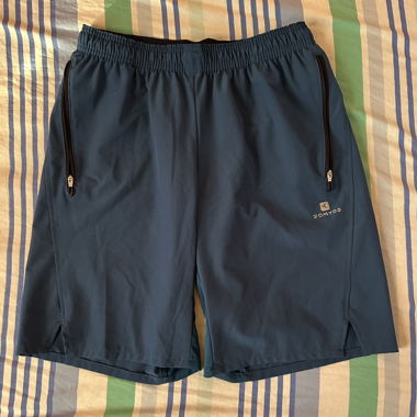 Short de sport Domyos bleu – Taille S/M