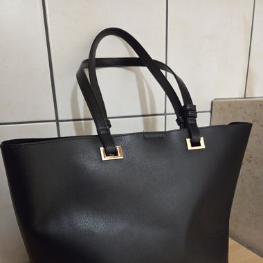 Tasche abzugeben