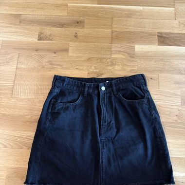 Kurzer schwarzer Jeans Rock