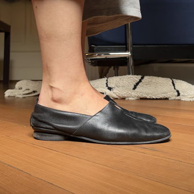 Slipper in pelle neri