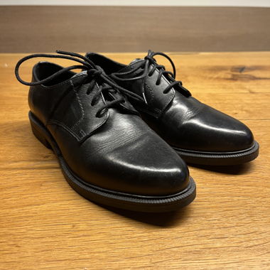 Black leather lace-up shoes