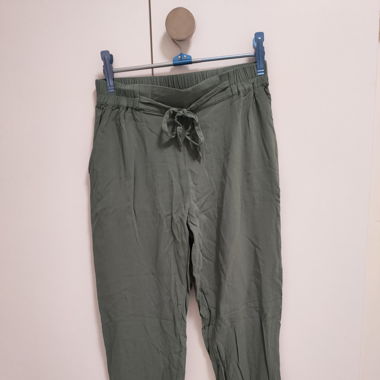 Green fabric trousers