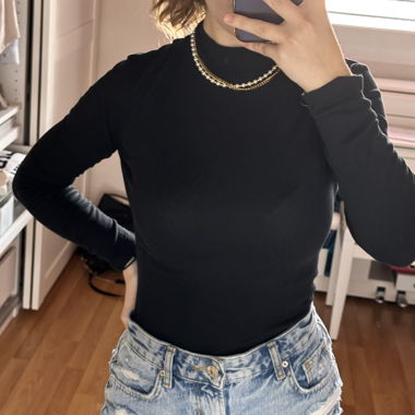 Body noir col roulé H&M taille S élégant