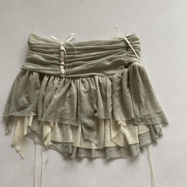 miniskirt with bows and buttons
