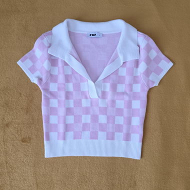 Polo corto in maglia rosa e bianco