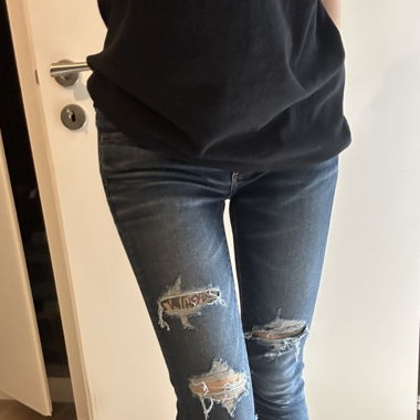 Skinny jeans troué
